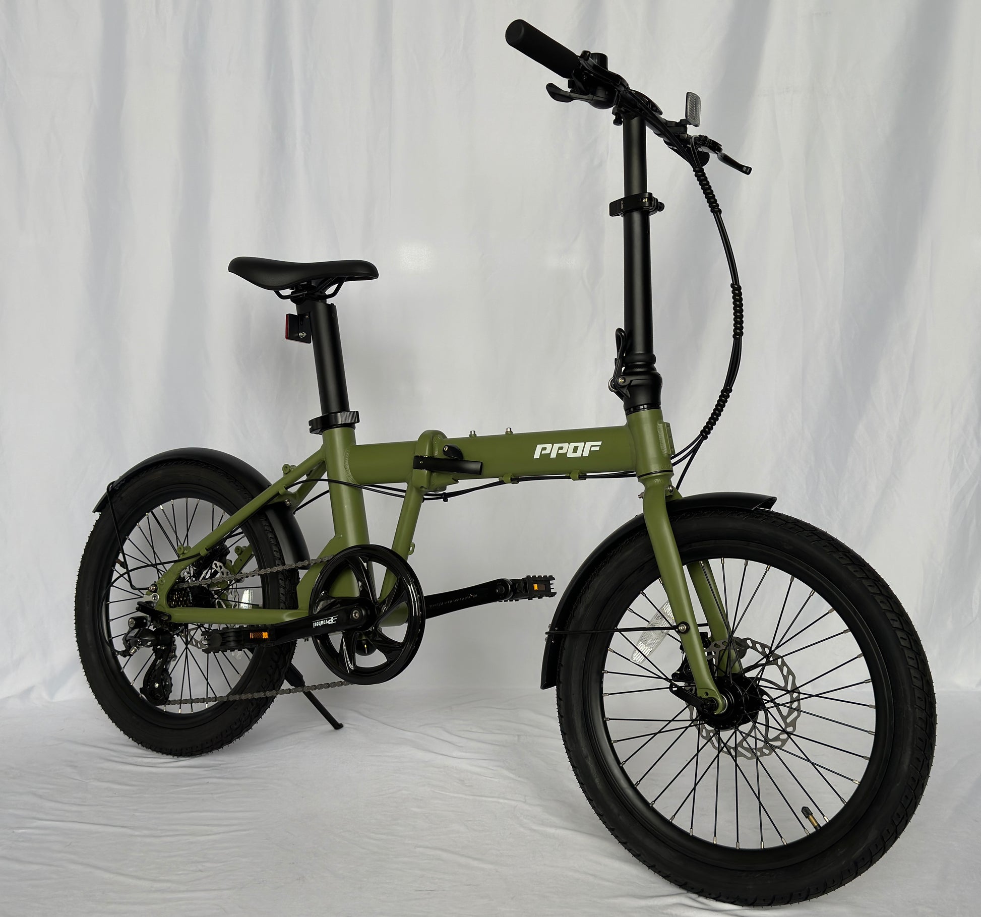 X-PPOF folding cycle with disc brakes for superior road control and urban commute.